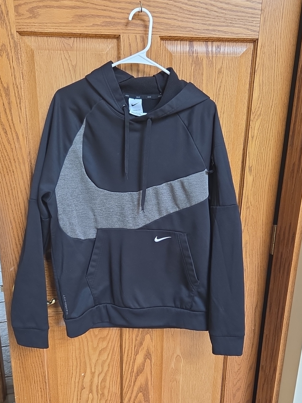 Nike Black Hoodie with Gray Swoosh Accent